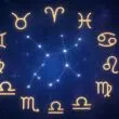 Illustration des douze signes du zodiaque avec une ambiance céleste et symbolique, représentant l’impact inconscient des signes astrologiques sur les relations amoureuses.
